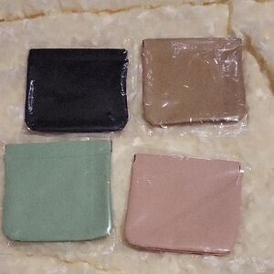 Set of Four Multi-Color Pouches